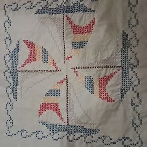 Hand embroidered quilt squares